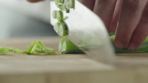 Professional Chef is Rapidly Chopping Spring Onion. Close-up. Stock Footage