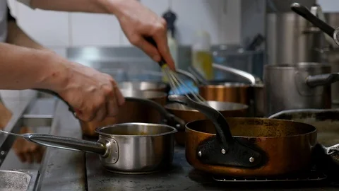 Professional Chef In A restaurant Kitchen Cooking Stock Footage 102334008