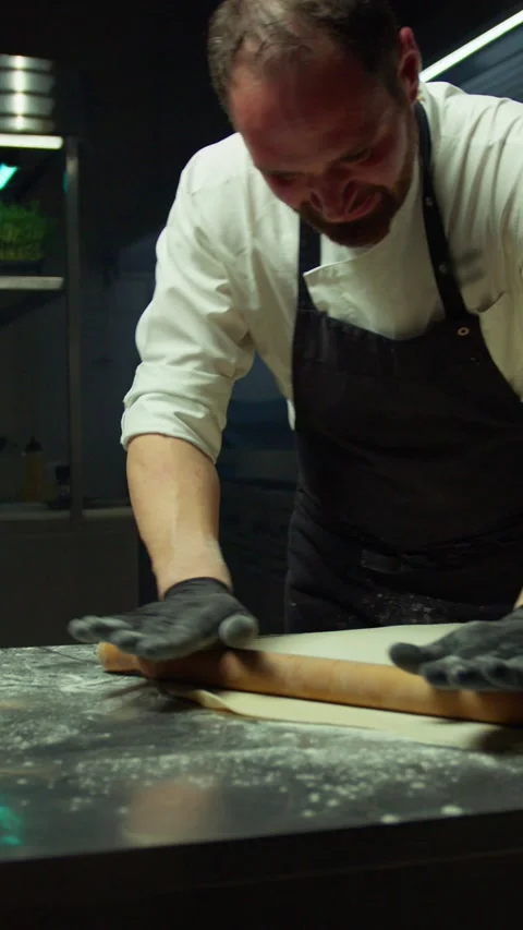 Professional Chef Rolls Out Dough To Make Stuffed Ravioli In A Hotel Kitchen Video stock 279754906