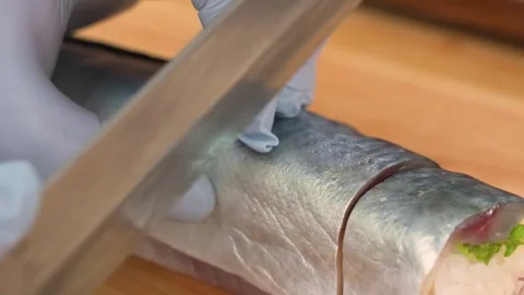 Professional Chef Slicing Fresh Fish Fillet for Sushi Preparation on Wooden Boar Stock Footage 333502490