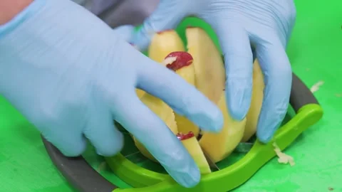 Professional Chef Slicing Fresh Fruit for Dessert Preparation Stock Footage 337751337