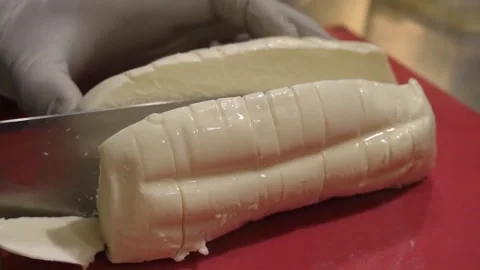 Professional Chef Slicing Fresh Mozzarella Cheese for Authentic Italian Pizza Stock Footage 337678720