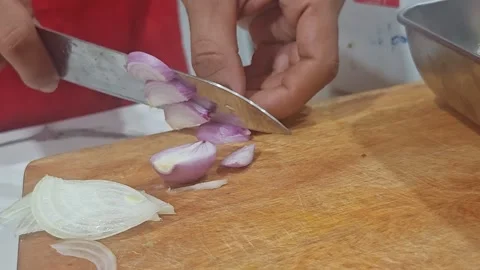 Professional Chef Slicing Fresh Shallots on Wooden Cutting Board Video stock 332884255