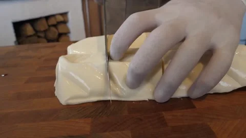 Professional Chef Slicing Mozzarella Pizza Cheese with a Pizza Cutter on a Woode Video stock 337677181