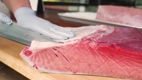 Professional Chef Slicing Premium Bluefin Tuna Belly (Toro) for Sashimi Stock Footage 333498885