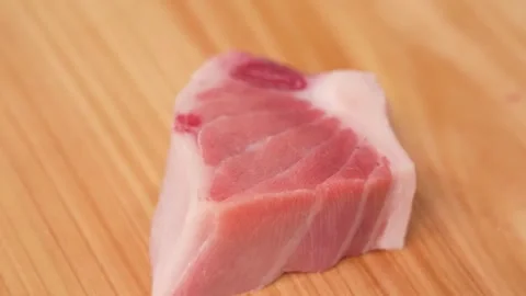 Professional Chef Slicing Premium Bluefin Tuna Otoro for Sashimi and Nigiri Stock Footage 333499425
