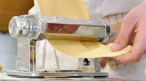 Professional Chef Stretch Dough Using a Special Machine for Dough in Slow Motion Stock Footage 60611271