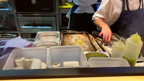 Professional Chef Takes Asparagus Off A Baking Tray In Commercial Kitchen Stock Footage 219694558