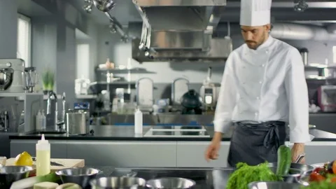 Professional Chef Working in a Famous Restaurant Kitchen.  Stock Footage 77095542