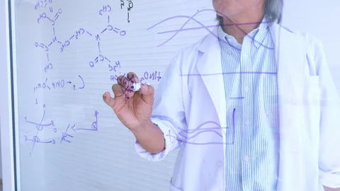 Professional chemist analysis chemical formula on mirror board at laboratory. 動画素材 119480576