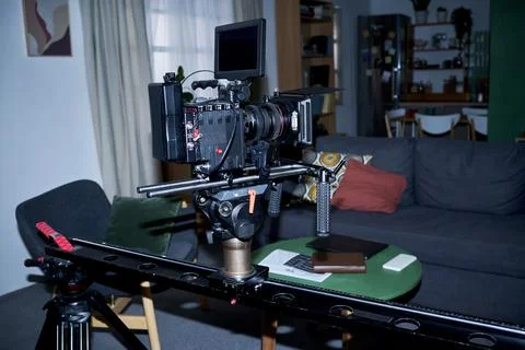 Professional Cinema Camera Mounted on Slider Rig for Video Production Stock Photos