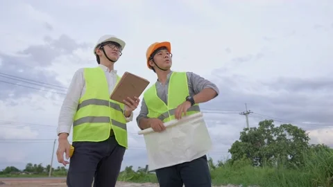 Professional civil engineering working on outdoor construction site Stock Footage 157067856