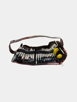 Professional clay sculpting tools set inside a brown leather case. Stock Photos
