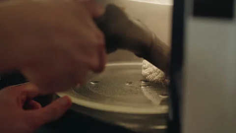 Professional cleaner worker using steam cleaner to remove grease and burnt food Stock Footage 310801422