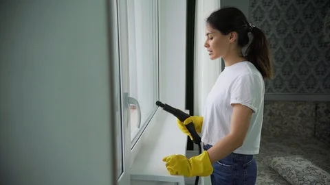 Professional cleaning of Windows. Window washing with special detergent . a Stock Footage 95995554