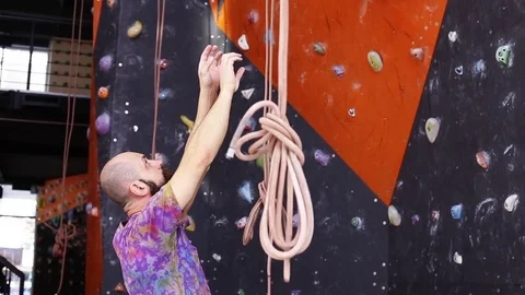 Professional climber plans his next route. Video 1080p resolution Stock Footage 77804027