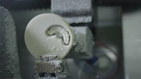 A professional CNC machine automatically creates a tooth prosthesis. The drill Stock Footage 146917096