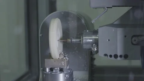 A professional CNC machine automatically creates a tooth prosthesis. The drill Stock Footage 147176956