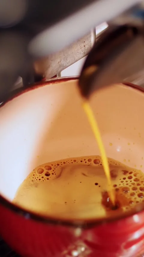 Professional coffee brewing. Close-up. Making cup of strong coffee in coffee Stock Footage 320299269