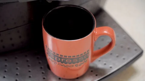 Professional coffee brewing. Selective focus on a mug. Stock Footage 95002294