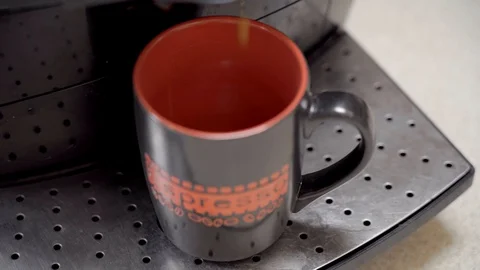 Professional coffee brewing. Selective focus on a mug. Stock Footage 95002365