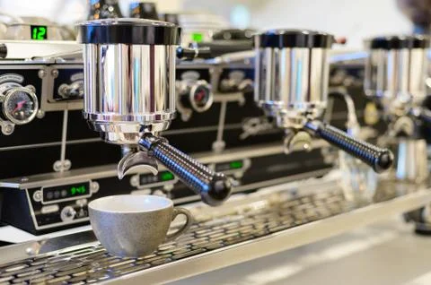 Professional coffee machine with cup Stock Photos