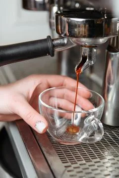 Professional coffee machine making espresso in a cafe Stock Photos