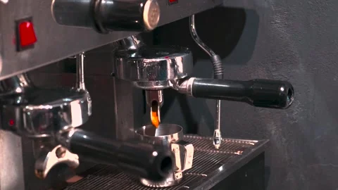 Professional coffee machine making hot espresso shot or americano in coffee shop Video stock 250781523