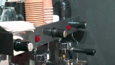 Professional coffee machine making hot espresso shot or americano in coffee shop Video stock 250781743