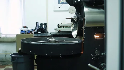 Professional coffee machine for roasting coffee beans. Coffee raw beans Stock Footage 100184427