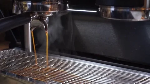Professional coffee machine spilling double espresso coffee Video stock 84836030