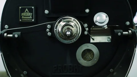 Professional coffeemachine and raw coffee beans. Stock Footage 100143797