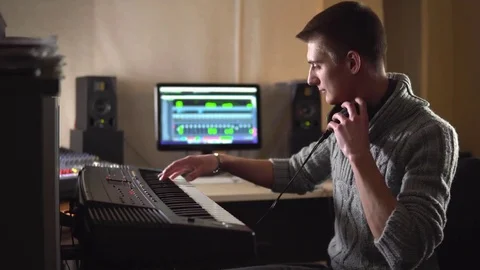 Professional composer writes music in the Studio, electronic piano Stock Footage 72286682
