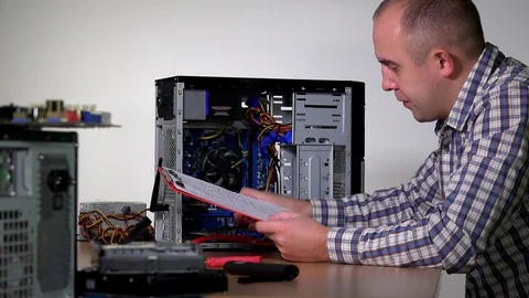 Professional computer service specialist man install ram memory Stock Footage 88360381