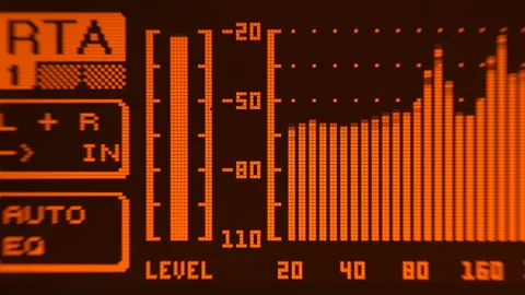 The professional concert equalizer has a yellow spectrum analyzer on the display Stock Footage 142329102