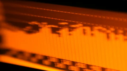The professional concert equalizer has a yellow spectrum analyzer on the display Stock Footage 142338690