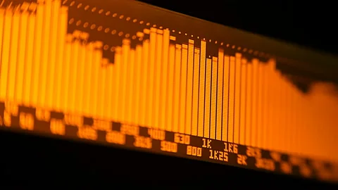 The professional concert equalizer has a yellow spectrum analyzer on the display Stock Footage 142388053