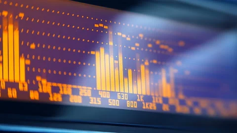 The professional concert equalizer has a yellow spectrum analyzer on the display Stock Footage 142391657