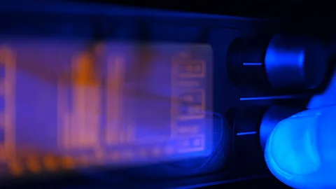 The professional concert equalizer has a yellow spectrum analyzer on the display Stock Footage 142416307
