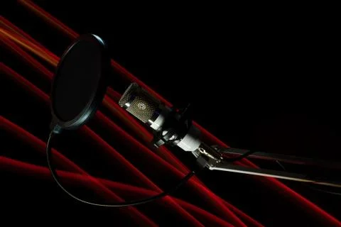 Professional condenser studio microphone on the black background and freezeli Stock Photos