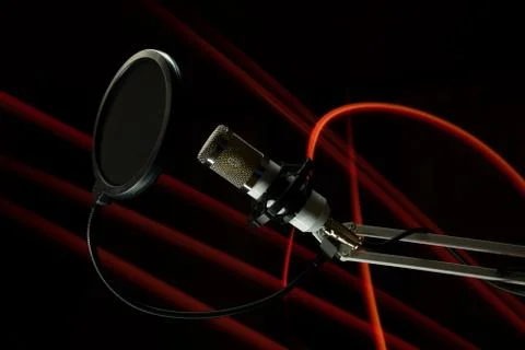 Professional condenser studio microphone on the black background Stock-Fotos