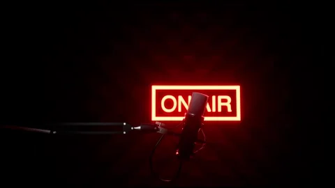 Professional Condenser Studio Microphone with Red Neon On Air Sign for Podcast Stock Footage 334536344