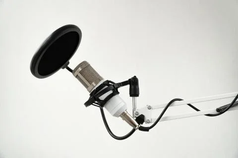 Professional condenser studio microphone on the white background Foto stock