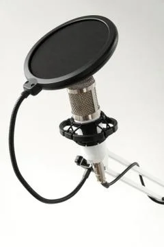 Professional condenser studio microphone on the white background Foto stock