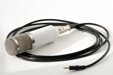 Professional condenser studio microphone on the white background Stock Photos