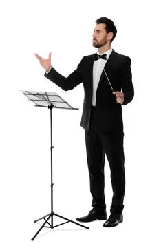 Professional conductor with baton and note stand on white background Stock Photos