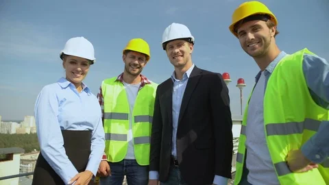 Professional construction team showing thumbs up gesture smiling on camera Stock-Footage 117212422