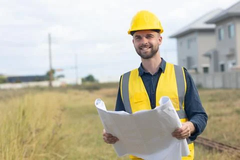 Professional construction worker engineer male. Real estate house project b.. Stock Photos