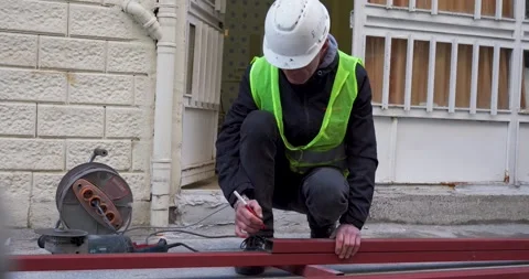 Professional Construction Worker Marking Metal Beam - Turkey 02 Mar 2026 Stock Footage 330027239