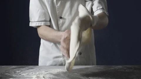 Professional cook preparing a delicious fresh pizza Stock Footage 127414191